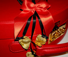 Load image into Gallery viewer, Perizoma con tre tortellini decorativi.